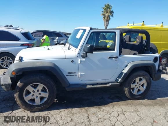 ✅ 2015 Jeep Wrangler Willys Wheeler • VIN: 1C4AJWAG1FL636417 • Lot: 43704796. Listed on IAAI with 81,914 mi. Free auction sales archive from the USA and detailed vehicle history report at DreamBid. Image 15.
