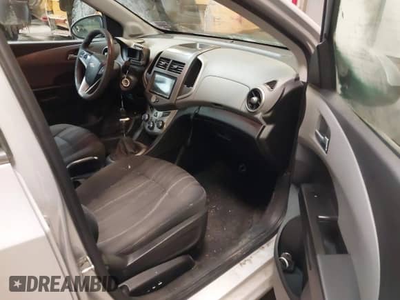 2013 Chevrolet Sonic LT with VIN 1G1JD6SH7D4203621, listed as a IAAI auction lot 41546319 with 201,164 mi miles and . Bid and sale history available at DreamBid. Image 5.