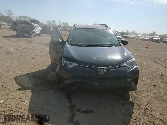 ✅ 2017 Toyota RAV4 LE • VIN: 2T3BFREV4HW571627 • Lot: 84623655. Listed on Copart with 132,920 mi. Free auction sales archive from the USA and detailed vehicle history report at DreamBid. Image 13.