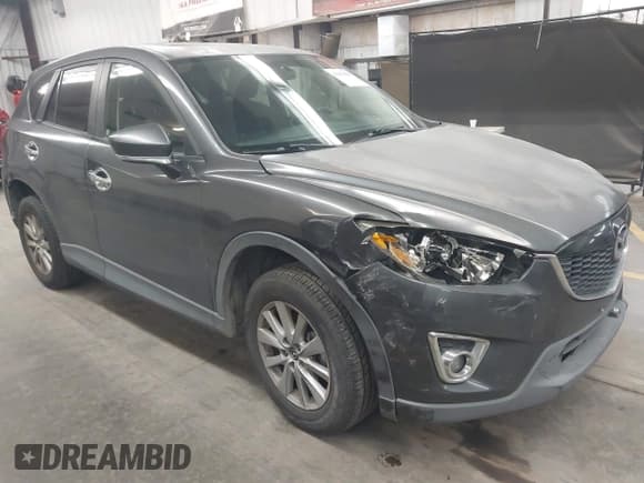 ✅ 2014 Mazda CX-5 Touring • VIN: JM3KE4CY0E0430130 • Lot: 43830898. Wystawiony na IAAI z przebiegiem 169 053 mil. Bezpłatny archiwum sprzedaży aukcyjnych z USA i szczegółowy raport historii pojazdu na DreamBid. Zdjęcie 1.