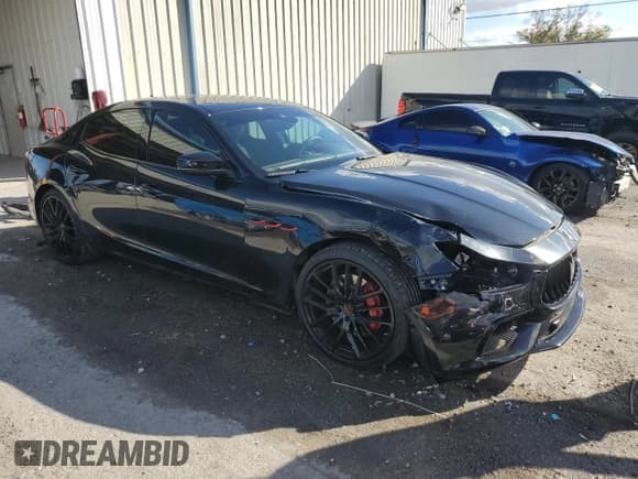 ✅ 2022 Maserati Ghibli Modena Q4 • VIN: ZAM57YTM1NX394830 • Lot: 84266984. Listed on Copart with 16,940 mi. Free auction sales archive from the USA and detailed vehicle history report at DreamBid. Image 4.