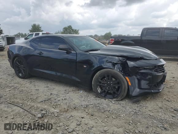 ✅ 2021 Chevrolet Camaro 1LS • VIN: 1G1FB1RX3M0137717 • Lot: 65838665. Listed on Copart with 90,024 mi. Free auction sales archive from the USA and detailed vehicle history report at DreamBid. Image 4.