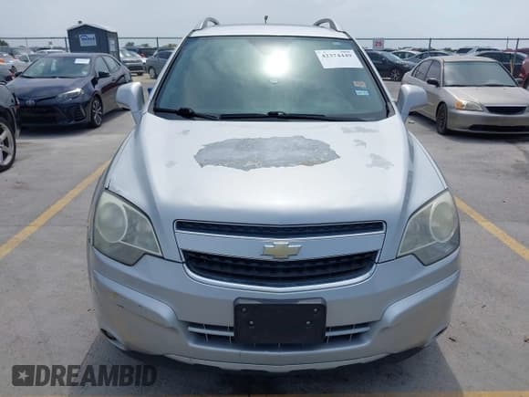 ✅ 2014 Chevrolet Captiva Sport LT • VIN: 3GNAL3EK2ES613395 • Lot: 42374449. Wystawiony na IAAI z przebiegiem 155 509 mil. Bezpłatny archiwum sprzedaży aukcyjnych z USA i szczegółowy raport historii pojazdu na DreamBid. Zdjęcie 6.