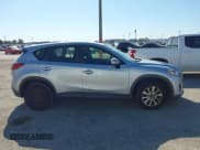 ✅ 2016 Mazda CX-5 Sport • VIN: JM3KE2BY9G0650696 • Lot: 43758478. Wystawiony na IAAI z przebiegiem 123 501 mil. Bezpłatny archiwum sprzedaży aukcyjnych z USA i szczegółowy raport historii pojazdu na DreamBid. Zdjęcie 13.
