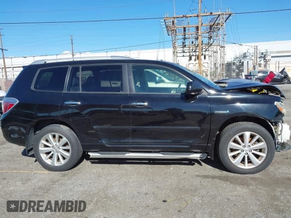 ✅ 2010 Toyota Highlander Limited • VIN: JTEJW3EHXA2045175 • Lot: 43785532. Listed on IAAI with 210,781 mi. Free auction sales archive from the USA and detailed vehicle history report at DreamBid. Image 14.