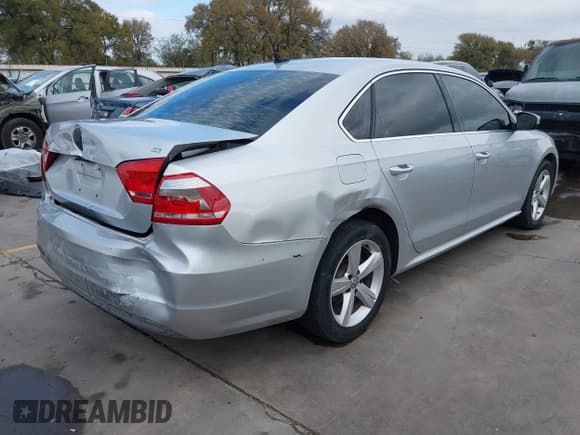 ✅ 2013 Volkswagen Passat SE • VIN: 1VWBP7A39DC034221 • Lot: 43707852. Listed on IAAI with 159,151 mi. Free auction sales archive from the USA and detailed vehicle history report at DreamBid. Image 4.