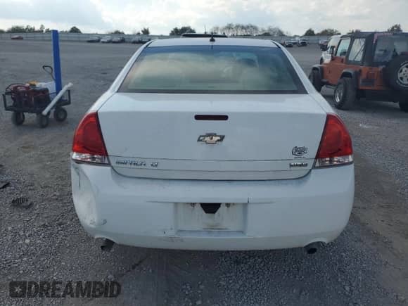 2013 Chevrolet Impala LT z VIN 2G1WG5E35D1136133, wystawiony jako Copart lot #80821445 z przebiegiem 228 287 mil mil oraz Szkoda całkowita • Salvage title. Historia ofert i sprzedaży dostępna na DreamBid. Obrazek 6.