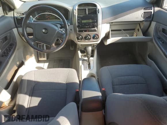 ✅ 2005 Kia Spectra • VIN: KNAFE161355121968 • Lot: 54621465. Listed on Copart with 221,951 mi. Free auction sales archive from the USA and detailed vehicle history report at DreamBid. Image 8.