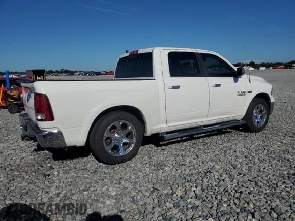 ✅ 2014 Ram 1500 Laramie • VIN: 1C6RR7NT0ES282779 • Лот: 83848485. Опубликован ранее на Copart с пробегом 212 046 миль. Бесплатный доступ к архиву аукционных продаж из США и подробный отчёт об истории автомобиля на DreamBid. Изображение 3.