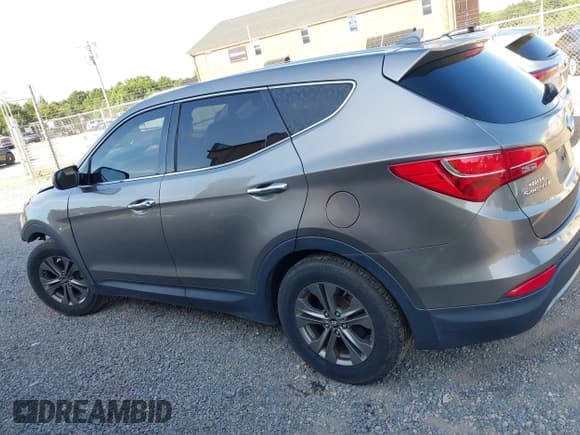 ✅ 2014 Hyundai Santa Fe • VIN: 5XYZTDLB3EG133890 • Лот: 42767468. Опубликован ранее на IAAI с пробегом 165 566 миль. Бесплатный доступ к архиву аукционных продаж из США и подробный отчёт об истории автомобиля на DreamBid. Изображение 14.