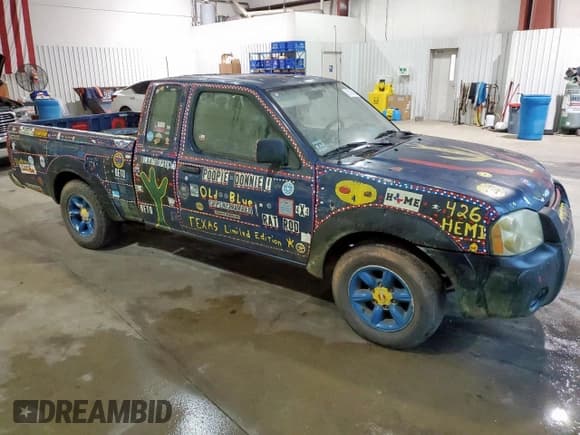 ✅ 2001 Nissan Frontier XE • VIN: 1N6DD26S91C404129 • Lot: 60164595. Listed on Copart with 217,667 mi. Free auction sales archive from the USA and detailed vehicle history report at DreamBid. Image 4.