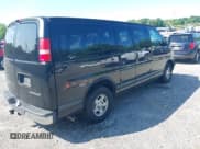 ✅ 2005 Chevrolet Express Passenger • VIN: 1GNFG15T751169844 • Lot: 42393893. Listed on IAAI with 226,673 mi. Free auction sales archive from the USA and detailed vehicle history report at DreamBid. Image 4.