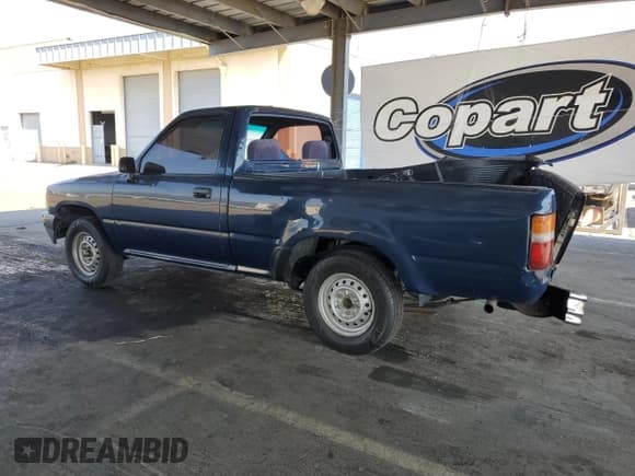 ✅ 1990 Toyota Pickup • VIN: JT4RN81A2L0052829 • Lot: 64253875. Listed on Copart with 220,265 mi. Free auction sales archive from the USA and detailed vehicle history report at DreamBid. Image 2.