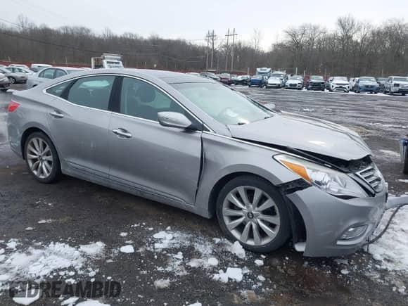 2014 Hyundai Azera Limited with VIN KMHFH4JG6EA361378, listed as a IAAI auction lot 41557210 with 58,561 mi miles and . Bid and sale history available at DreamBid. Image 1.
