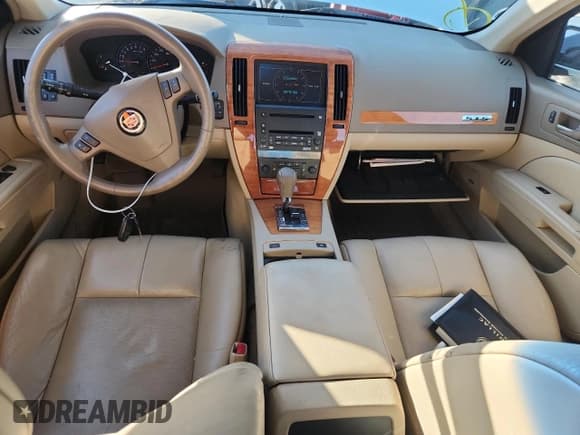 ✅ 2006 Cadillac STS • VIN: 1G6DW677360218886 • Lot: 84905405. Listed on Copart with 103,466 mi. Free auction sales archive from the USA and detailed vehicle history report at DreamBid. Image 8.