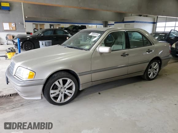 ✅ 1999 Mercedes-Benz C 230/260/280/320 • VIN: WDBHA24G7XA740618 • Lot: 78695104. Listed on Copart with 144,512 mi. Free auction sales archive from the USA and detailed vehicle history report at DreamBid. Image 1.