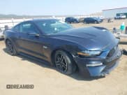 ✅ 2021 Ford Mustang GT • VIN: 1FA6P8CF2M5147469 • Lot: 43120831. Listed on IAAI with 28,250 mi. Free auction sales archive from the USA and detailed vehicle history report at DreamBid. Image 1.