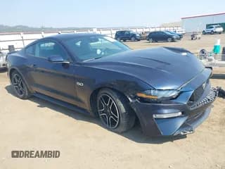 ✅ 2021 Ford Mustang GT • VIN: 1FA6P8CF2M5147469 • Lot: 43120831. Listed on IAAI with 28,250 mi. Free auction sales archive from the USA and detailed vehicle history report at DreamBid. Image 1.