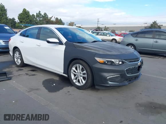 ✅ 2018 Chevrolet Malibu Hybrid • VIN: 1G1ZF5SU8JF140033 • Lot: 43673797. Listed on IAAI with 111,657 mi. Free auction sales archive from the USA and detailed vehicle history report at DreamBid. Image 1.