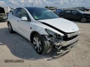 ✅ 2022 Tesla Model Y Long Range • VIN: 7SAYGDEE6NF327170 • Лот: 82334885. Опубликован ранее на Copart с пробегом 76 961 миль. Бесплатный доступ к архиву аукционных продаж из США и подробный отчёт об истории автомобиля на DreamBid. Изображение 14.