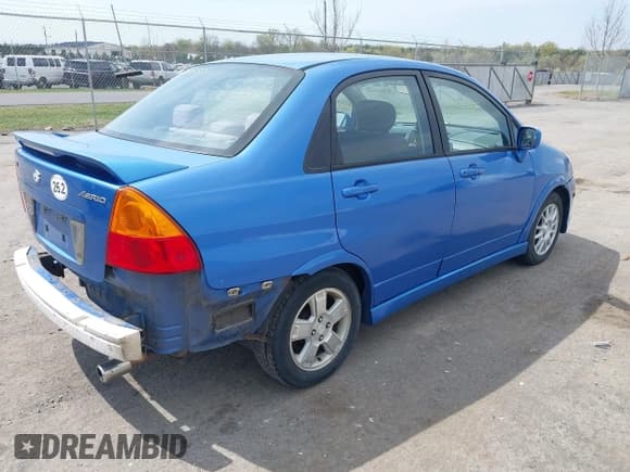 ✅ 2003 Suzuki Aerio S • VIN: JS2RA41S735169831 • Лот: 42025965. Опубликован ранее на IAAI с пробегом 214 238 миль. Бесплатный доступ к архиву аукционных продаж из США и подробный отчёт об истории автомобиля на DreamBid. Изображение 4.
