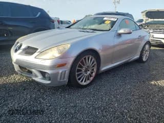 ✅ 2005 Mercedes-Benz SLK AMG • VIN: WDBWK73FX5F054969 • Лот: 74960714. Опубликован ранее на Copart с пробегом Не указан. Бесплатный доступ к архиву аукционных продаж из США и подробный отчёт об истории автомобиля на DreamBid. Изображение 1.