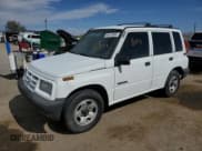 ✅ 1996 Geo Tracker • VIN: 2CNBE1364T6909947 • Lot: 54411835. Listed on Copart with 171,862 mi. Free auction sales archive from the USA and detailed vehicle history report at DreamBid. Image 1.