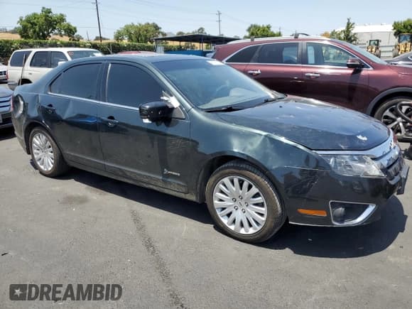 ✅ 2010 Ford Fusion Hybrid • VIN: 3FADP0L33AR185719 • Лот: 59821115. Опубликован ранее на Copart с пробегом 154 019 миль. Бесплатный доступ к архиву аукционных продаж из США и подробный отчёт об истории автомобиля на DreamBid. Изображение 4.
