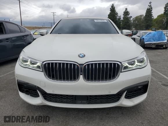 ✅ 2018 BMW 7 Series 750i • VIN: WBA7F0C53JGM24069 • Лот: 53515035. Опубликован ранее на Copart с пробегом 79 803 миль. Бесплатный доступ к архиву аукционных продаж из США и подробный отчёт об истории автомобиля на DreamBid. Изображение 5.