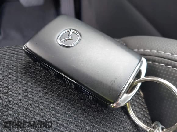 ✅ 2025 Mazda CX-50 S Preferred • VIN: 7MMVABBM1SN392085 • Lot: 43723950. Listed on IAAI with 1,452 mi. Free auction sales archive from the USA and detailed vehicle history report at DreamBid. Image 11.