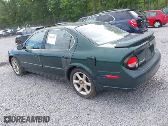 ✅ 2001 Nissan Maxima GXE • VIN: JN1CA31D91T615792 • Lot: 42521675. Listed on IAAI with 94,495 mi. Free auction sales archive from the USA and detailed vehicle history report at DreamBid. Image 3.