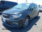 ✅ 2021 Chrysler Pacifica Hybrid Touring L • VIN: 2C4RC1L71MR599631 • Lot: 42151965. Listed on IAAI with 67,401 mi. Free auction sales archive from the USA and detailed vehicle history report at DreamBid. Image 2.