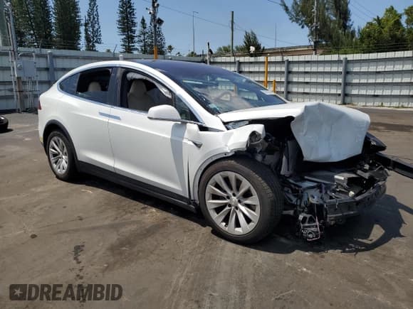 ✅ 2020 Tesla Model X Long Range • VIN: 5YJXCAE26LF271849 • Lot: 52869255. Listed on Copart with 108,147 mi. Free auction sales archive from the USA and detailed vehicle history report at DreamBid. Image 4.