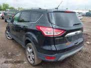 ✅ 2015 Ford Escape Titanium • VIN: 1FMCU9J94FUC39311 • Lot: 42542693. Listed on IAAI with 129,747 mi. Free auction sales archive from the USA and detailed vehicle history report at DreamBid. Image 3.