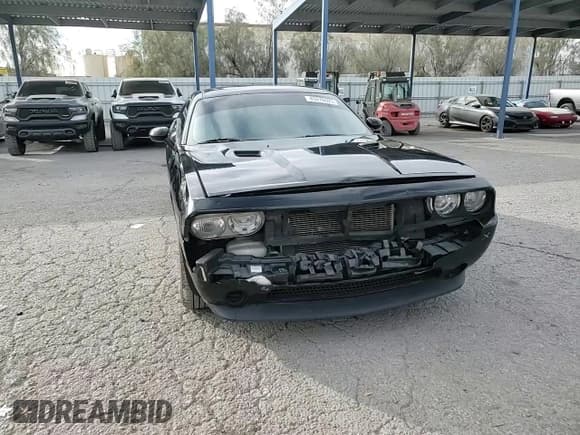 ✅ 2014 Dodge Challenger SXT • VIN: 2C3CDYAG8EH195803 • Lot: 43276925. Wystawiony na Copart z przebiegiem 131 569 mil. Bezpłatny archiwum sprzedaży aukcyjnych z USA i szczegółowy raport historii pojazdu na DreamBid. Zdjęcie 13.