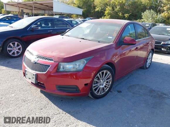 ✅ 2014 Chevrolet Cruze 1LT • VIN: 1G1PC5SB8E7306629 • Lot: 43700578. Listed on IAAI with 165,542 mi. Free auction sales archive from the USA and detailed vehicle history report at DreamBid. Image 2.