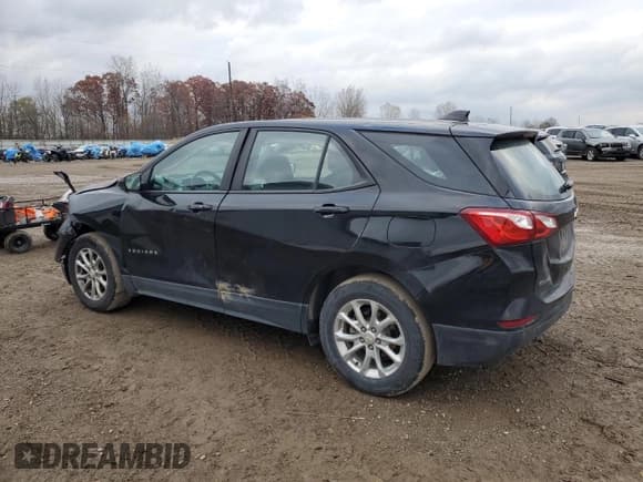 ✅ 2021 Chevrolet Equinox LS • VIN: 2GNAXHEV2M6154068 • Lot: 91410205. Listed on Copart with 77,473 mi. Free auction sales archive from the USA and detailed vehicle history report at DreamBid. Image 2.