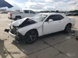 ✅ 2014 Dodge Challenger SXT • VIN: 2C3CDYAG1EH137399 • Lot: 71238334. Wystawiony na Copart z przebiegiem 165 497 mil. Bezpłatny archiwum sprzedaży aukcyjnych z USA i szczegółowy raport historii pojazdu na DreamBid. Zdjęcie 1.