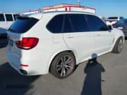 ✅ 2014 BMW X5 xDrive35i • VIN: 5UXKR0C53E0H21184 • Lot: 43520480. Listed on IAAI with 75,808 mi. Free auction sales archive from the USA and detailed vehicle history report at DreamBid. Image 4.