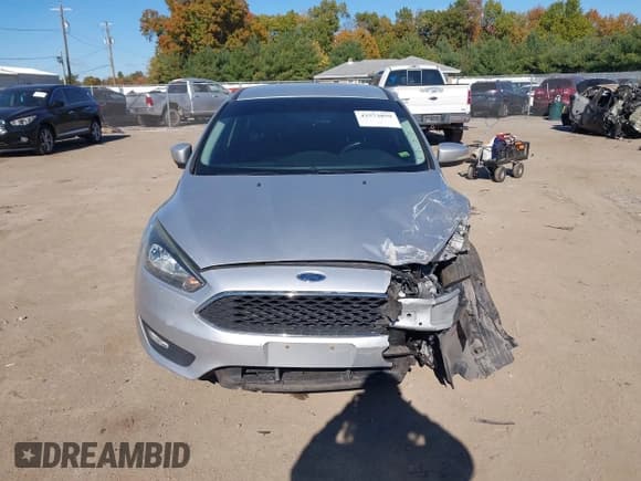 ✅ 2016 Ford Focus SE • VIN: 1FADP3F2XGL243059 • Lot: 43573859. Listed on IAAI with 104,132 mi. Free auction sales archive from the USA and detailed vehicle history report at DreamBid. Image 12.