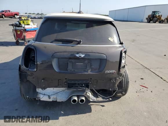 2014 MINI Hardtop S with VIN WMWXM7C59ET987820, listed as a Copart auction lot 59164955 with 77,699 mi miles and Salvage title. Bid and sale history available at DreamBid. Image 6.