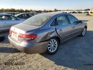 2007 Hyundai Azera SE с VIN KMHFC46F47A181897, выставлен на аукционе Copart как лот 76106303 с пробегом 39 959 миль миль и Списание • Salvage title. История ставок и продаж доступна на DreamBid. Изображение 3.