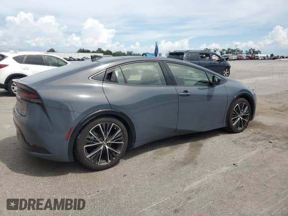 2024 Toyota Prius LE with VIN JTDACAAU5R3025104, listed as a Copart auction lot 65556565 with 18,003 mi miles and Salvage title. Bid and sale history available at DreamBid. Image 3.