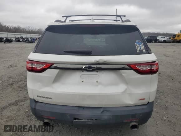 2018 Chevrolet Traverse RS с VIN 1GNERJKX6JJ153514, выставлен на аукционе Copart как лот 87037444 с пробегом 164 078 миль миль и Списание • Salvage title. История ставок и продаж доступна на DreamBid. Изображение 6.