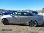 ✅ 2016 Lincoln MKZ • VIN: 3LN6L2JK9GR628786 • Lot: 41738293. Listed on IAAI with 80,181 mi. Free auction sales archive from the USA and detailed vehicle history report at DreamBid. Image 14.