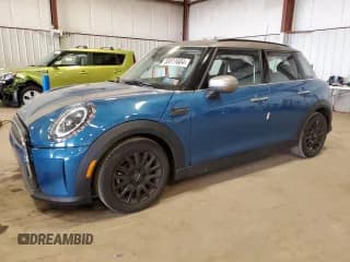 ✅ 2022 MINI Hardtop 4 Door Cooper • VIN: WMW33DK08N2P76748 • Lot: 58511604. Wystawiony na Copart z przebiegiem 20 769 mil. Bezpłatny archiwum sprzedaży aukcyjnych z USA i szczegółowy raport historii pojazdu na DreamBid. Zdjęcie 1.