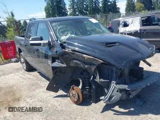 ✅ 2015 Ram 1500 Sport • VIN: 1C6RR7MT7FS601484 • Lot: 42690955. Listed on IAAI with 125,515 mi. Free auction sales archive from the USA and detailed vehicle history report at DreamBid. Image 1.