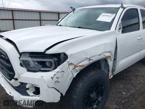 ✅ 2016 Toyota Tacoma SR • VIN: 5TFSX5EN2GX045433 • Lot: 41939147. Listed on IAAI with 122,702 mi. Free auction sales archive from the USA and detailed vehicle history report at DreamBid. Image 6.