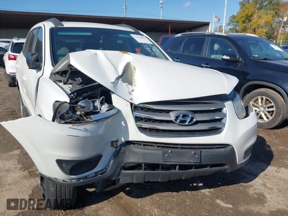 ✅ 2012 Hyundai Santa Fe GLS • VIN: 5XYZGDAB7CG092846 • Lot: 43448095. Listed on IAAI with 131,666 mi. Free auction sales archive from the USA and detailed vehicle history report at DreamBid. Image 6.