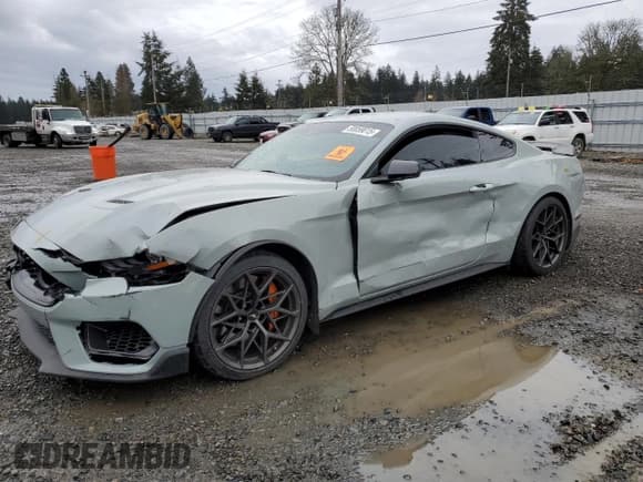 ✅ 2022 Ford Mustang Mach 1 • VIN: 1FA6P8R07N5551792 • Лот: 50059015. Опубликован ранее на Copart с пробегом Не указан. Бесплатный доступ к архиву аукционных продаж из США и подробный отчёт об истории автомобиля на DreamBid. Изображение 1.